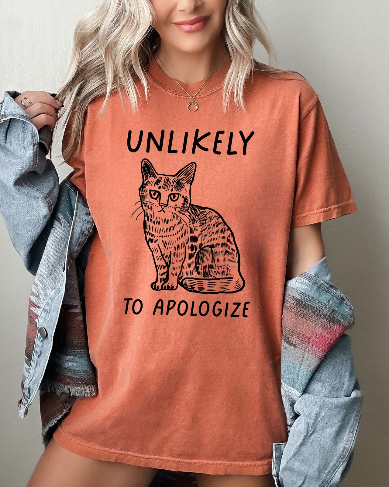 Unlikely To Apologize Cat Sarcastic Attitude Quote Graphic Premium Comfort Colors Tee