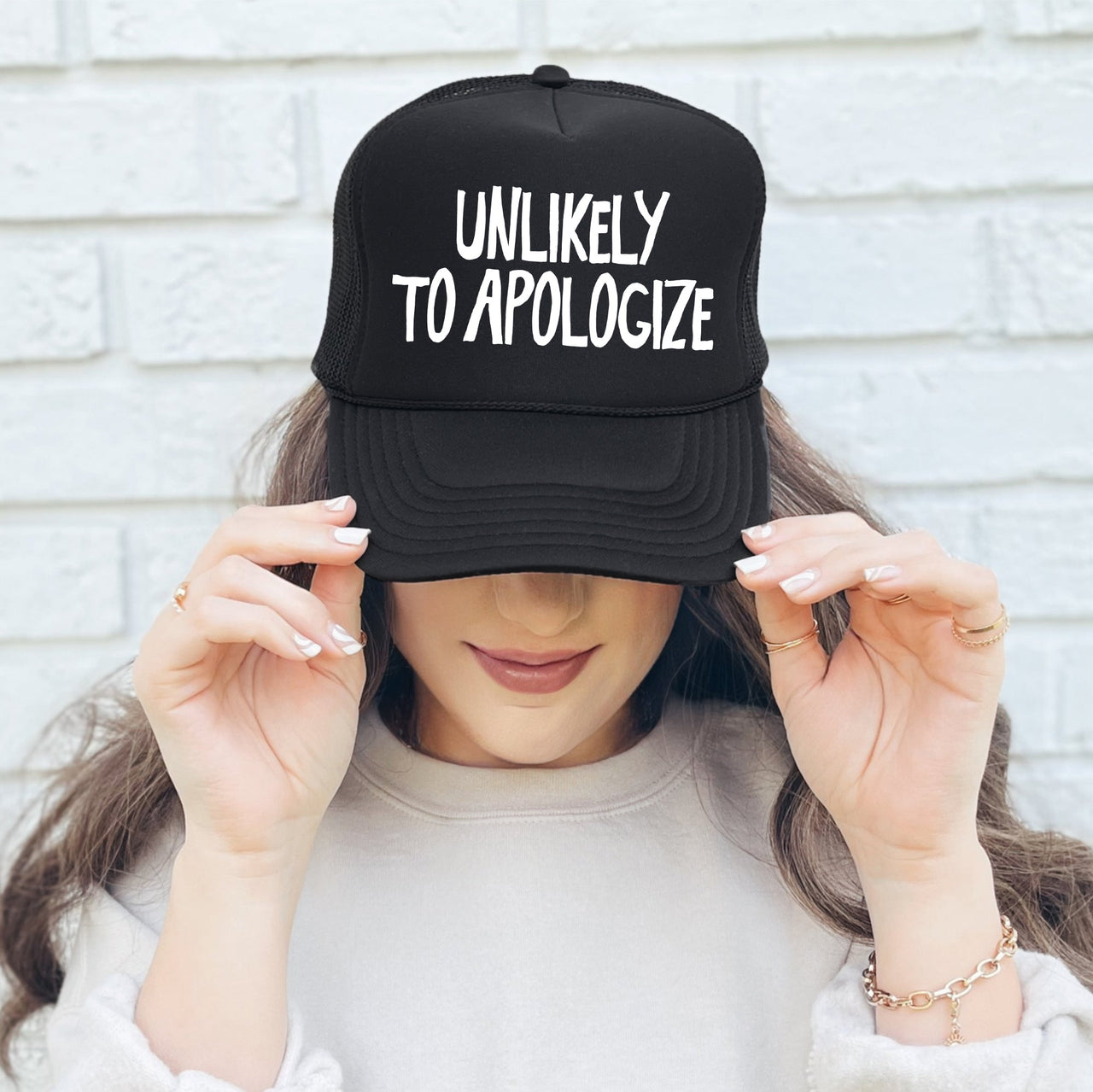Unlikely To Apologize Bold Sassy Attitude Statement Graphic Quote Design Trucker Hat