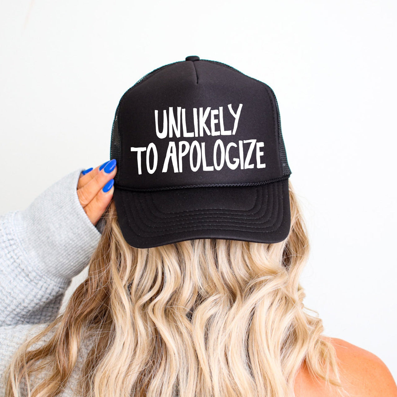 Unlikely To Apologize Bold Sassy Attitude Statement Graphic Quote Design Trucker Hat