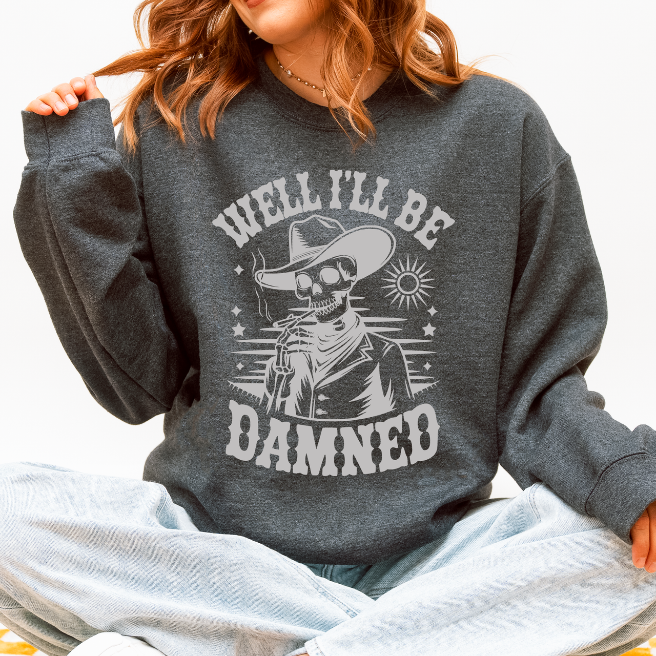 Well I'll Be Damned Skeleton Halloween Cozy Graphic Typography Ornaments Edition Sweatshirt