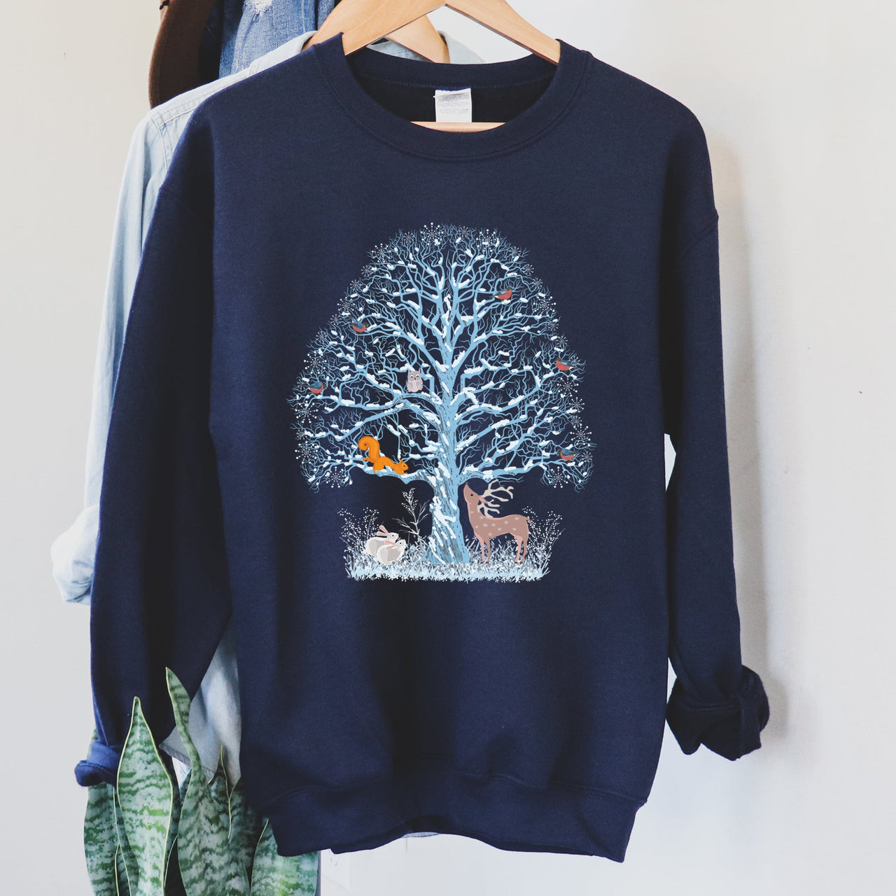 Winter Tree Filled With Animals Christmas Wildlife Woodland Scene Cozy Sweatshirt