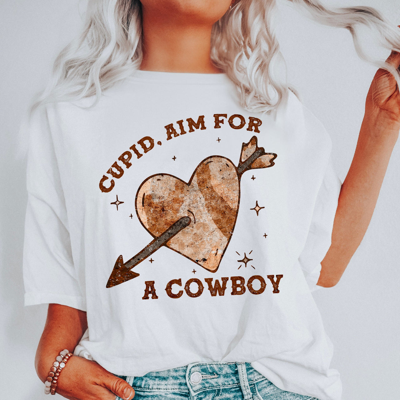 Cupid Aim For A Cowboy Western Heart Valentines Romance Motif Graphic Edition Comfort Colors Tee