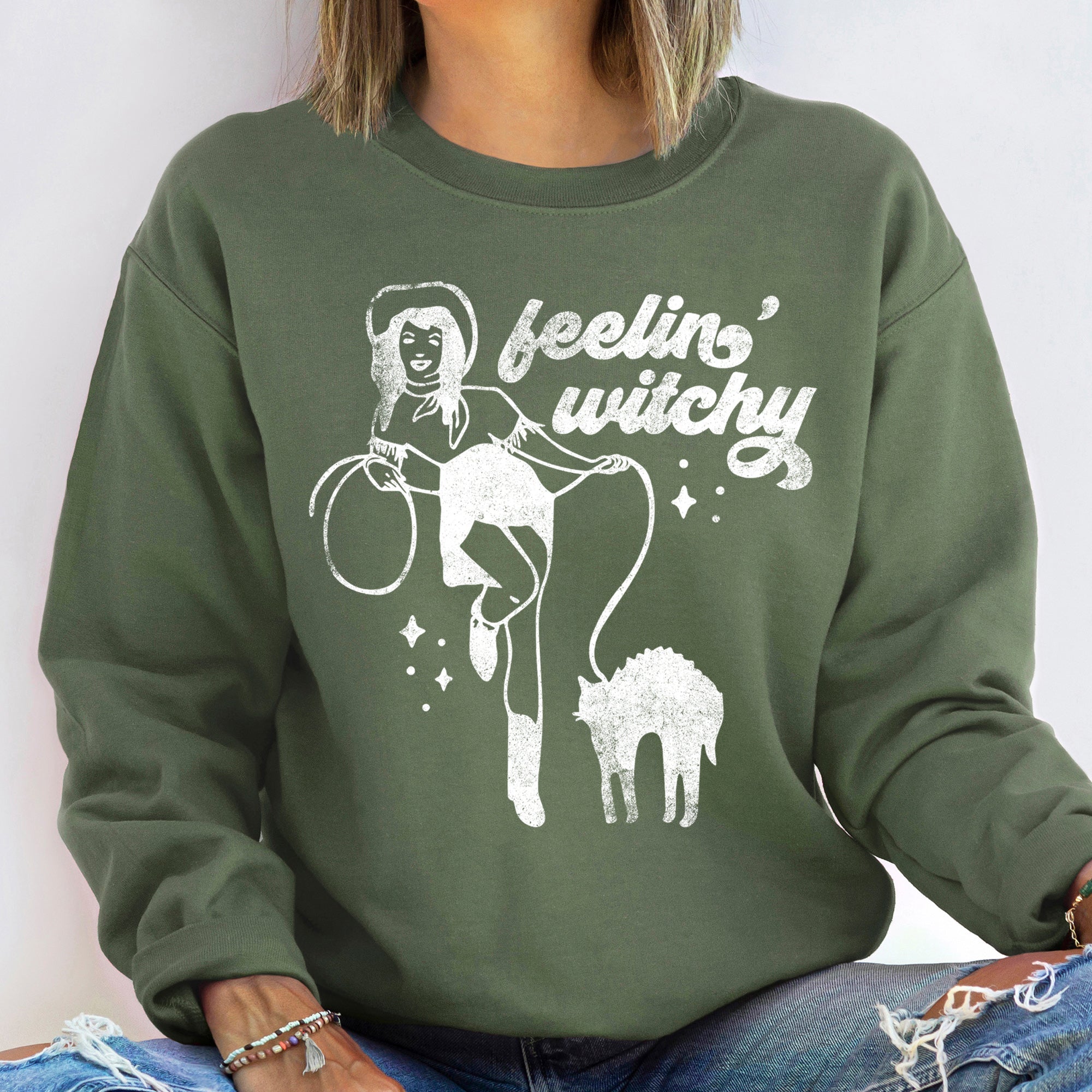 Feeling Witchy Vintage Halloween Night Spirits Moonlit Soiree Cozy Graveyard Moonlight Wreath Sweatshirt