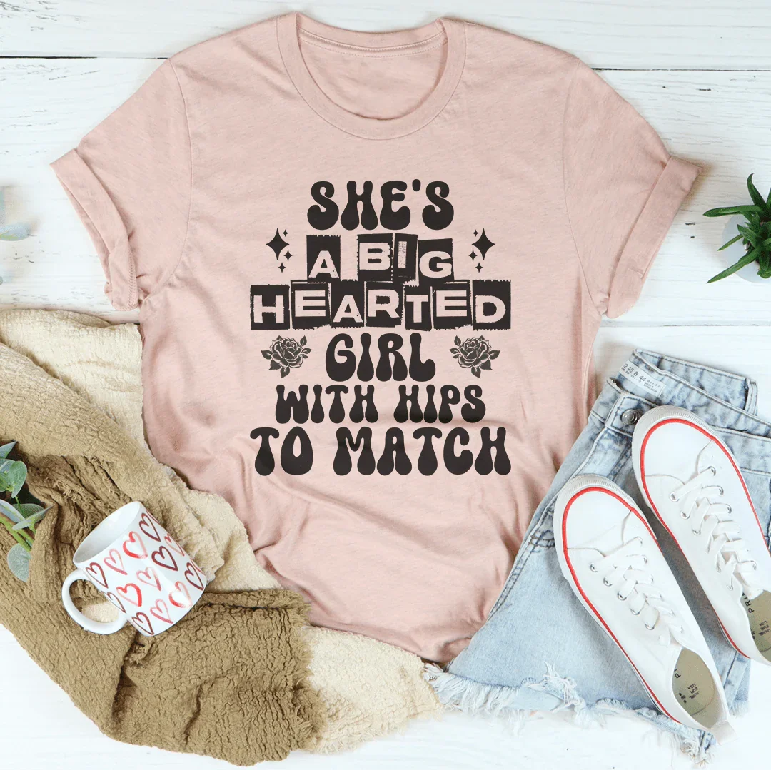 She's a big hearted girl with hips to match Tee